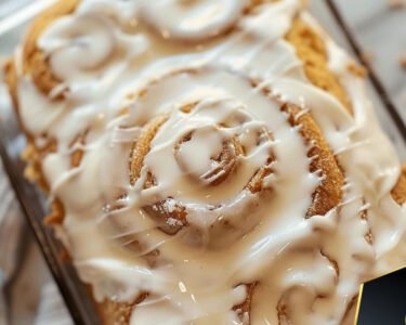 Cinnamon Roll Cake with Cream Cheese Frosting prepared at home with simple ingredients and clear steps.